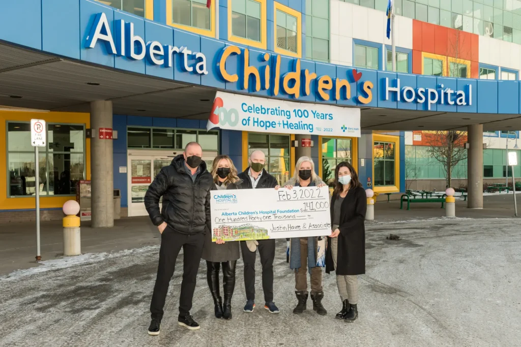 Justin Havre and Associates presenting a $141,000 donation to the Alberta Children's Hospital Foundation