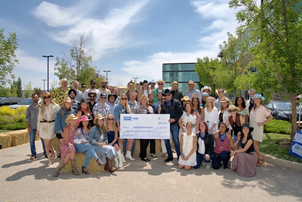 Justin Havre and Associates team presenting a $21,750 donation to Legacy Place Society in 2025